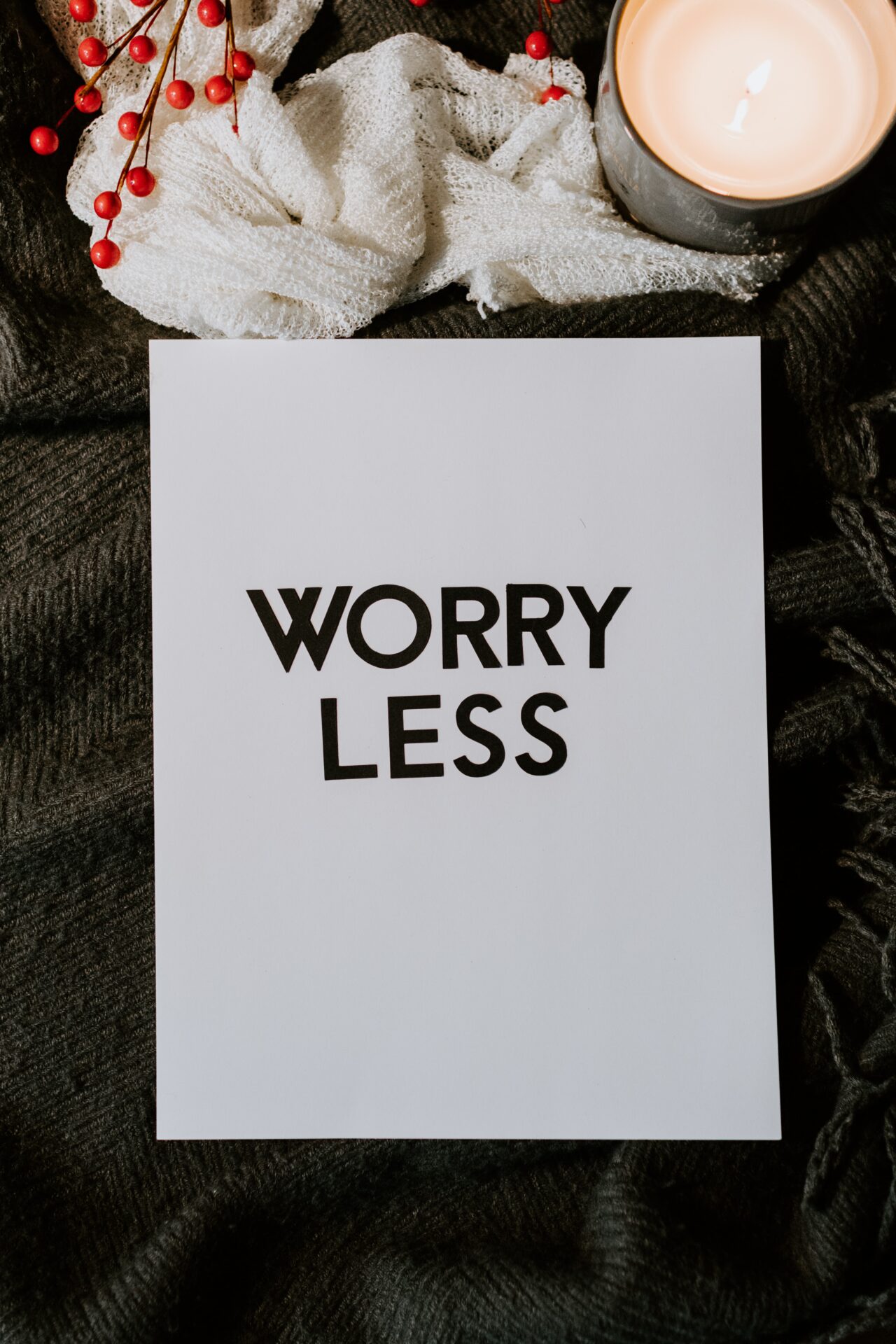 worry less on written on white paper